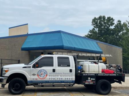 Why Hiring One Snellville Company for Both Pressure Washing and Painting Saves Time and Improves Results